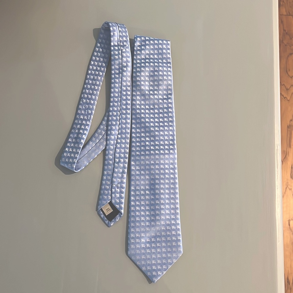 Burberry 100% silk blue tie with silver logo all over